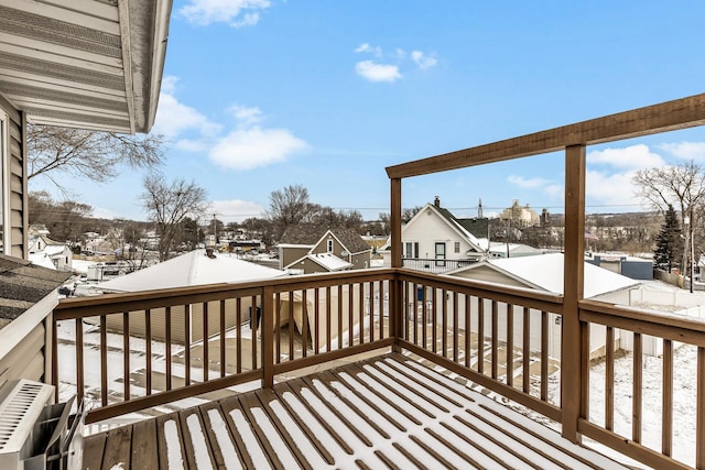 view of snow covered deck