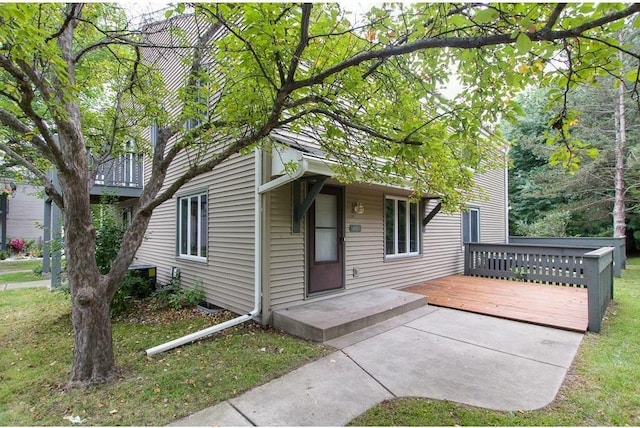 view of front of home with a deck