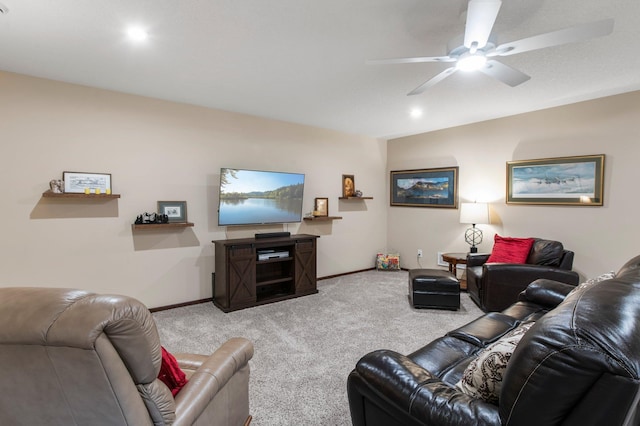 living room with ceiling fan and light carpet