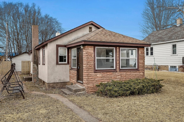 back of house with a yard