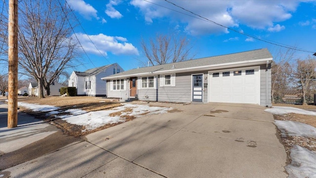 single story home featuring a garage