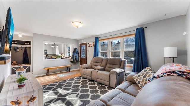 living room with light hardwood / wood-style floors