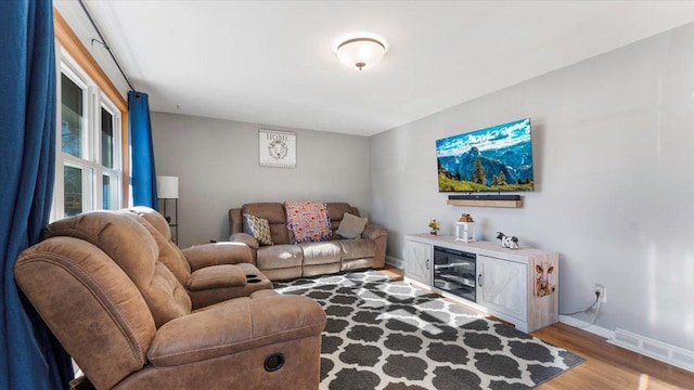 living room featuring light wood-type flooring