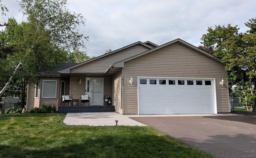 1433 Highland Ct, Stillwater, MN 55082 - ranch-style house with covered porch, driveway, and an attached garage