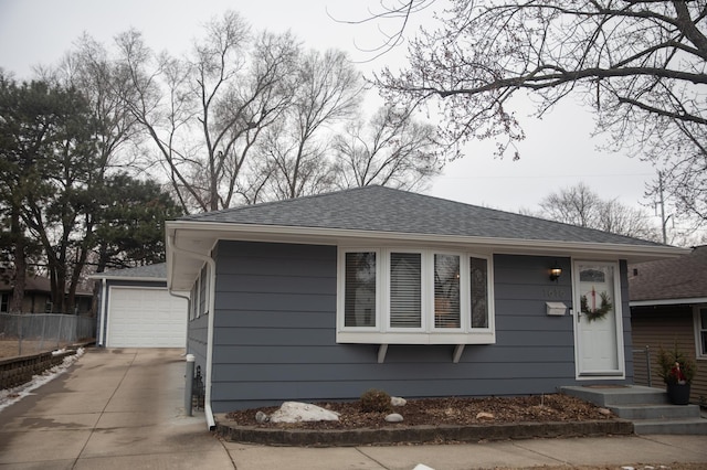 ranch-style house featuring a garage