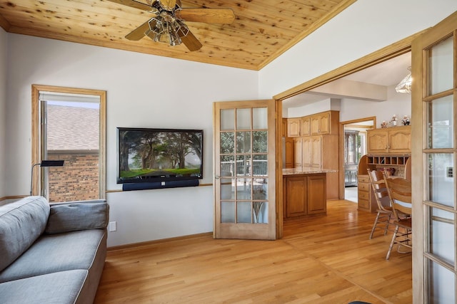 living room with french doors, lofted ceiling, wood ceiling, crown molding, and light hardwood / wood-style floors