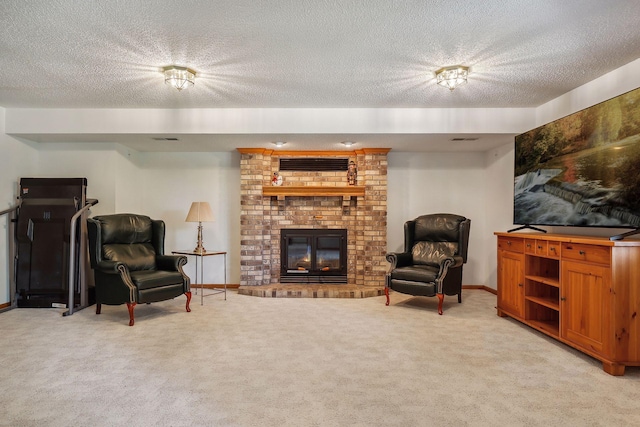 living room with light colored carpet, a brick fireplace, and a textured ceiling