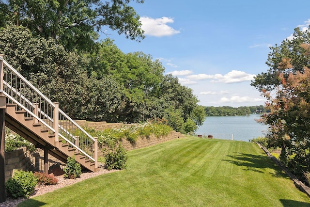 view of yard with a water view