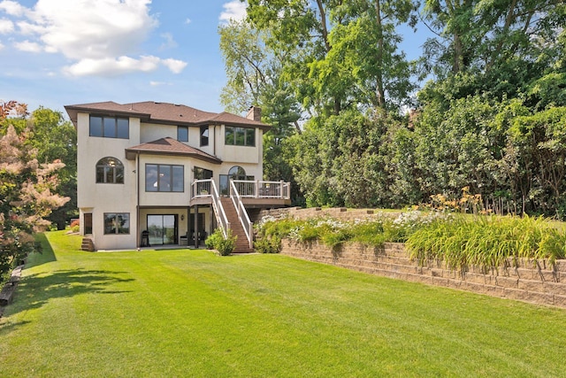 exterior space with a front lawn and a deck