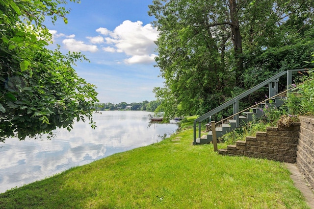 exterior space with a water view