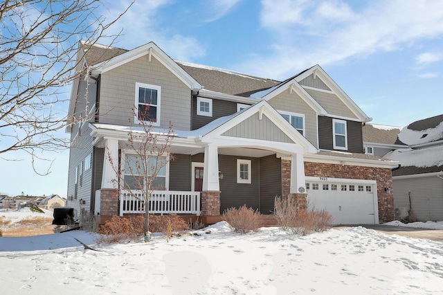 view of front of property with stone siding and a porch