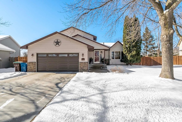 view of front of property featuring a garage