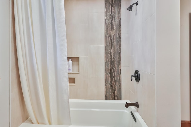 bathroom featuring shower / bathtub combination with curtain