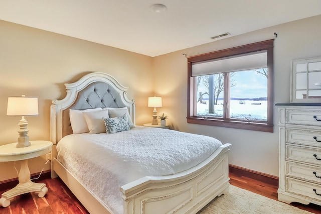 bedroom with light hardwood / wood-style floors