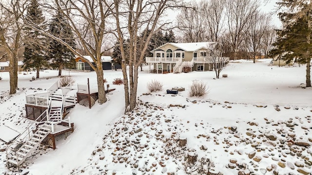 view of yard layered in snow