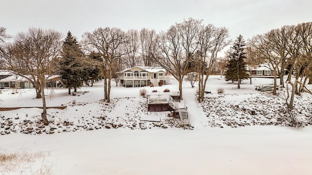 view of yard covered in snow