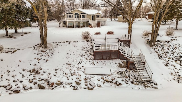 view of yard layered in snow