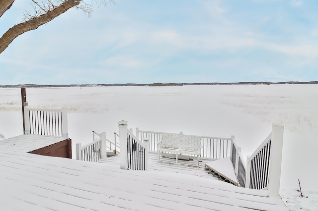 view of snow covered deck