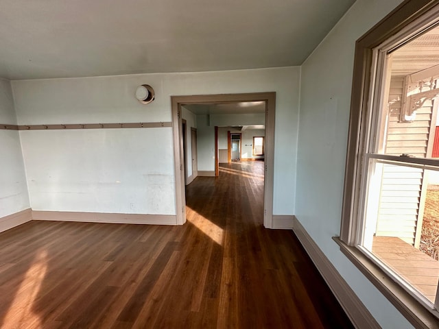 interior space with dark hardwood / wood-style flooring