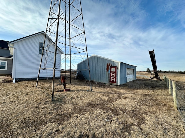 view of outdoor structure featuring a rural view