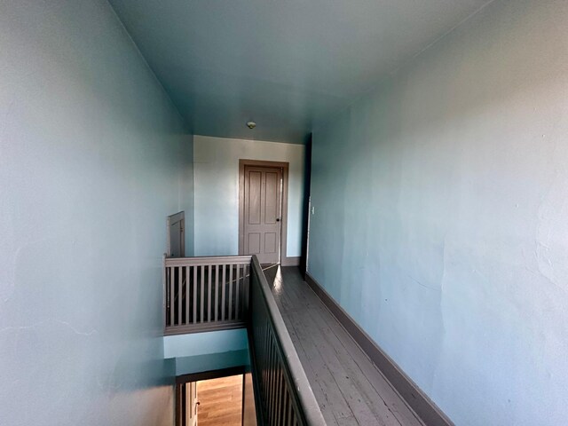 18426 County Road 18, Lewiston, MN 55952 - stairs with wood finished floors and baseboards