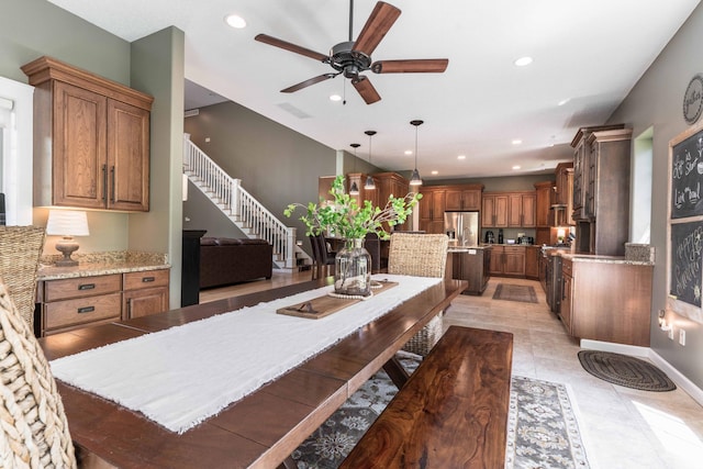 dining area featuring light tile patterned flooring and ceiling fan