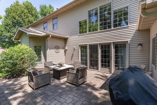 view of patio featuring grilling area and outdoor lounge area