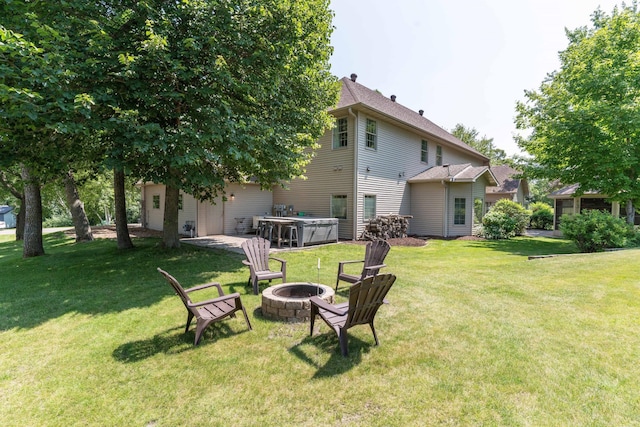 view of yard with a fire pit and a patio area