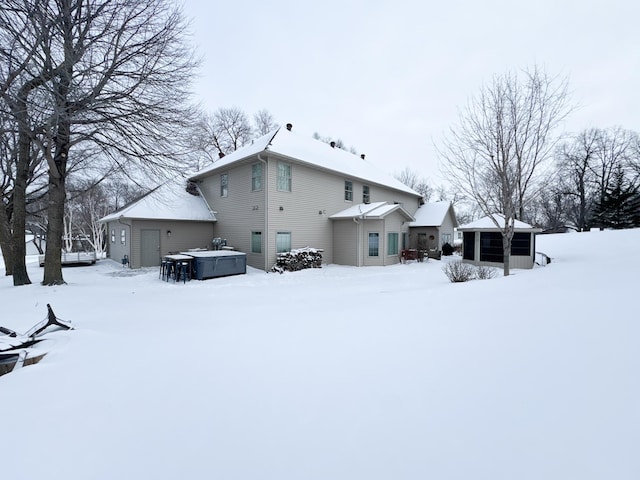 view of snow covered house