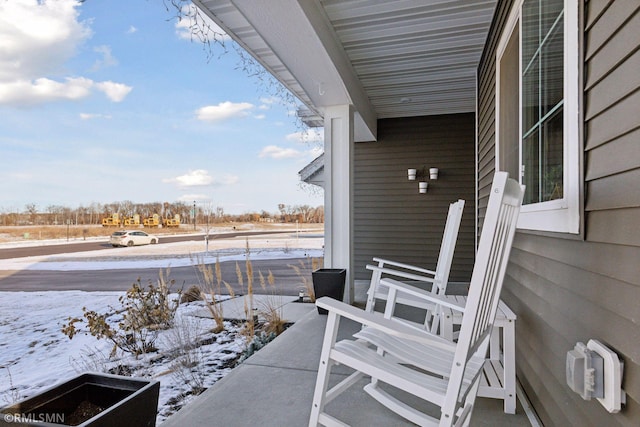 view of snow covered patio