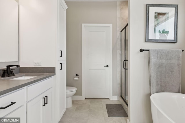 full bathroom with vanity, tile patterned floors, toilet, and separate shower and tub