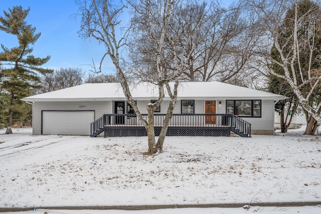 ranch-style home featuring a garage