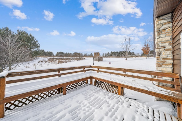 view of snow covered deck