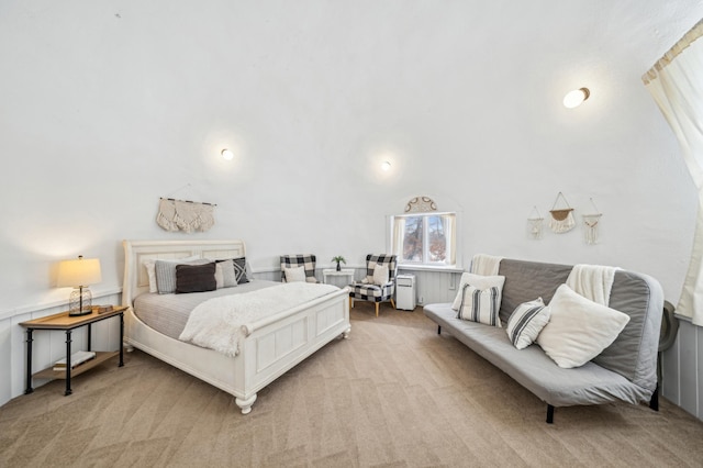 bedroom with light colored carpet