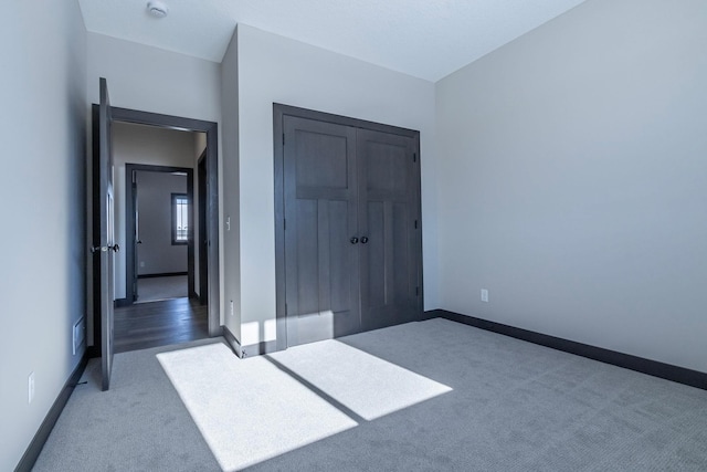 unfurnished bedroom with carpet flooring