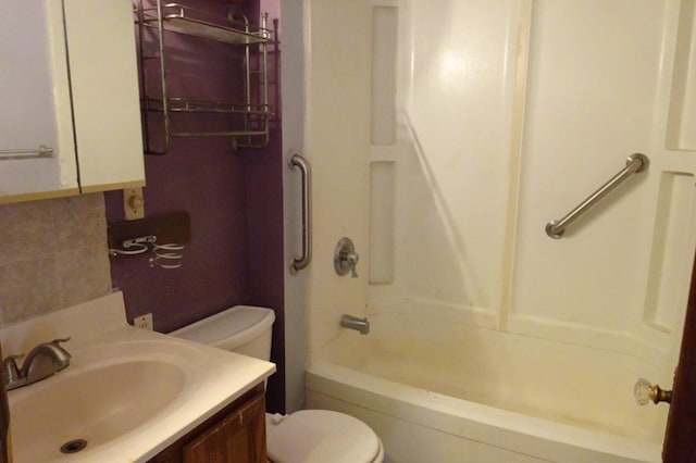 full bathroom featuring shower / bath combination, vanity, tasteful backsplash, and toilet