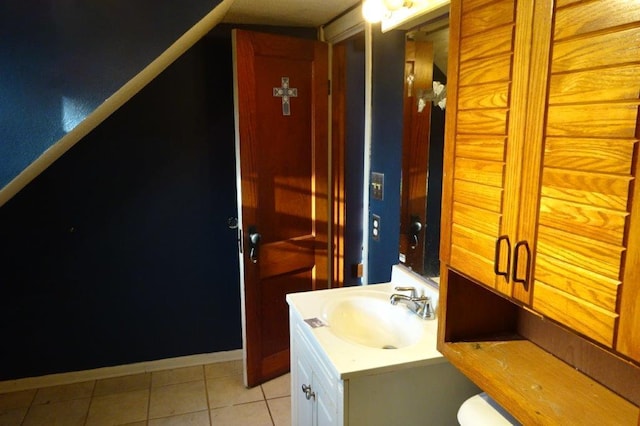 bathroom featuring vanity and tile patterned flooring