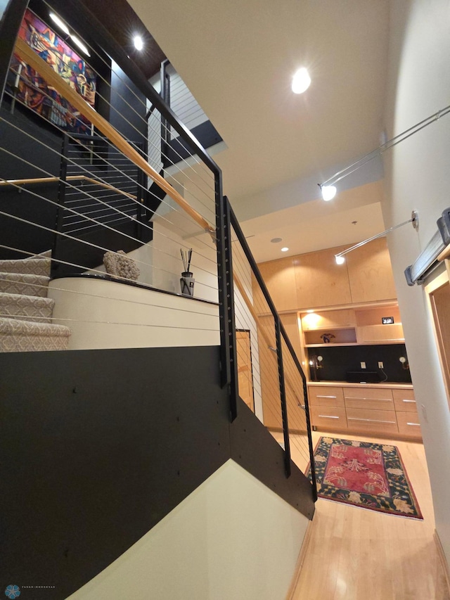 12 Broadway N Unit 206, Fargo, ND 58102 - stairs with wood finished floors and recessed lighting
