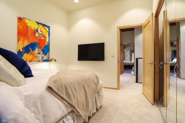 12 Broadway N Unit 206, Fargo, ND 58102 - bedroom featuring light carpet, baseboards, and recessed lighting