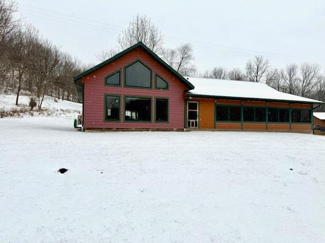 view of snow covered property