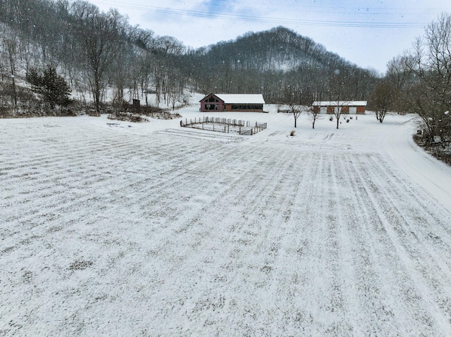 E2614 Bohland Hollow Rd, Wheatland Twp, WI 54624 - snowy aerial view with a mountain view