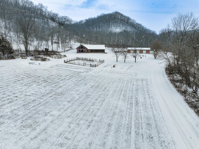 E2614 Bohland Hollow Rd, Wheatland Twp, WI 54624 - snowy aerial view with a mountain view