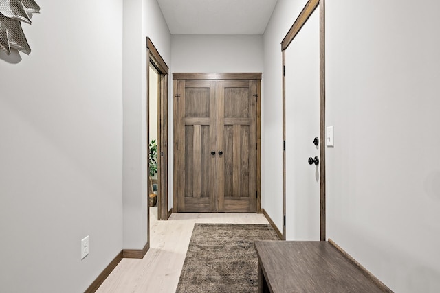 doorway featuring light hardwood / wood-style floors