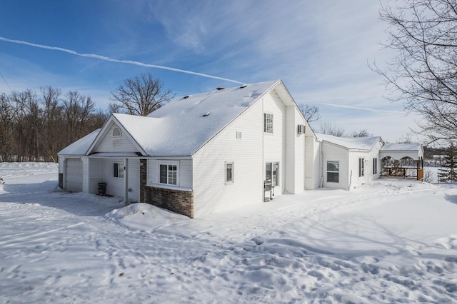 view of front of home featuring brick siding