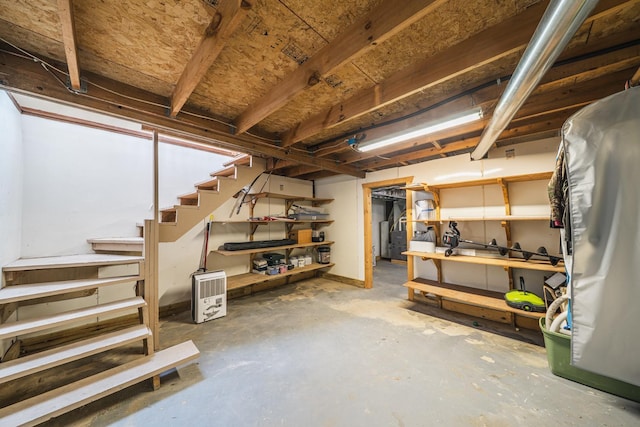 unfinished basement featuring stairway