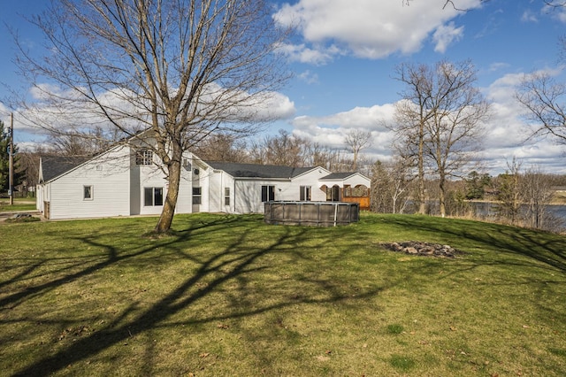 view of yard featuring an outdoor pool