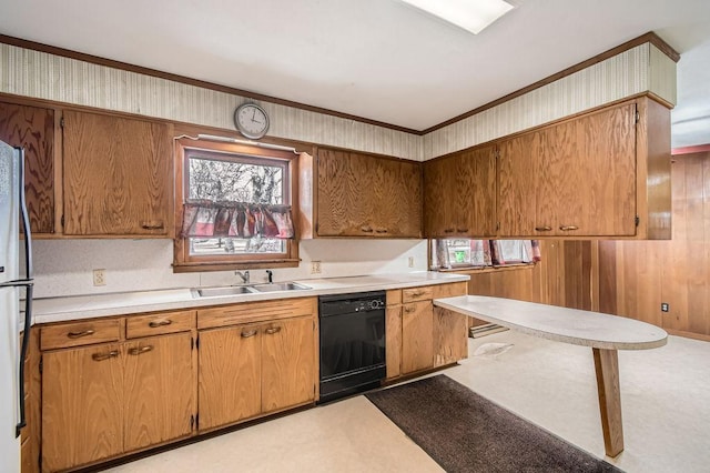 kitchen featuring light countertops, dishwasher, ornamental molding, a sink, and brown cabinetry