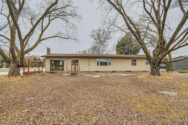manufactured / mobile home featuring crawl space and a chimney