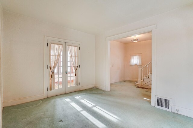 1802 3rd Ave N, Minneapolis, MN 55405 - carpeted spare room featuring french doors