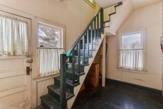1802 3rd Ave N, Minneapolis, MN 55405 - staircase with hardwood / wood-style flooring and lofted ceiling